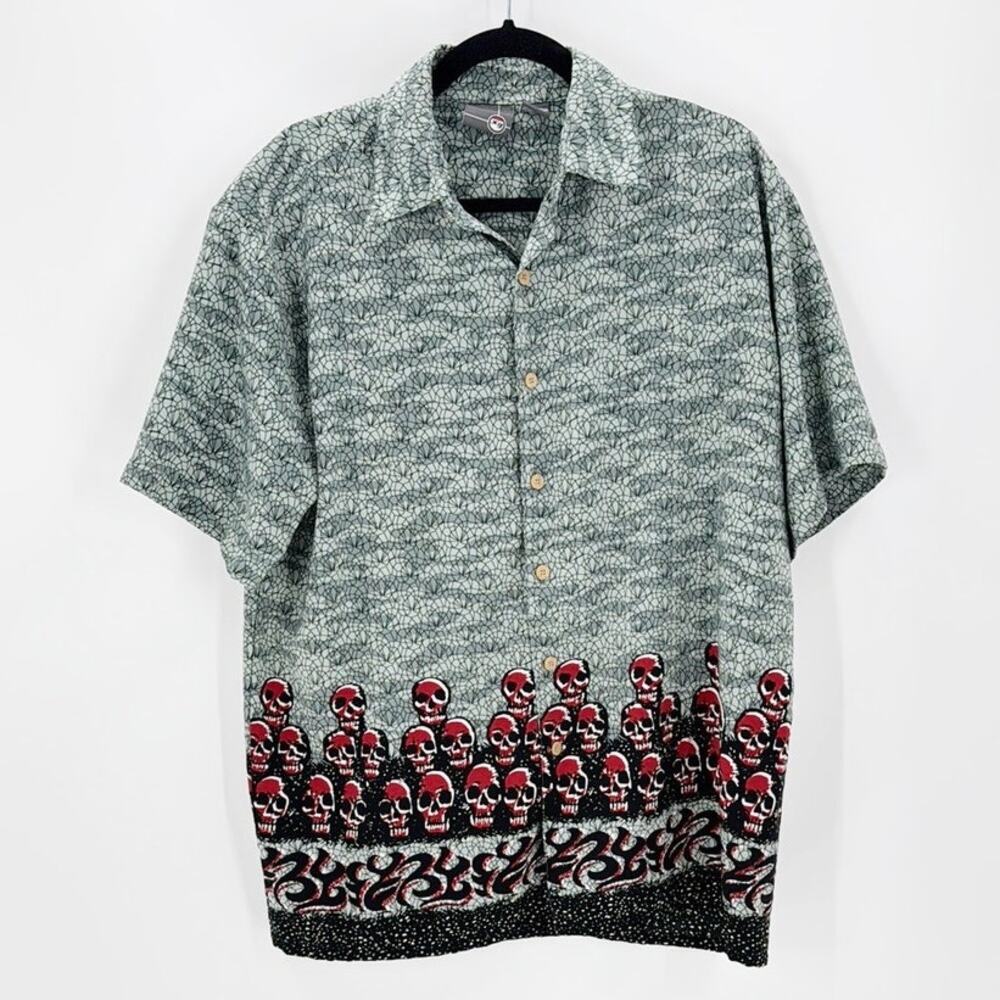 Vintage XG Y2K short sleeve button down shirt green with red skulls hem size M